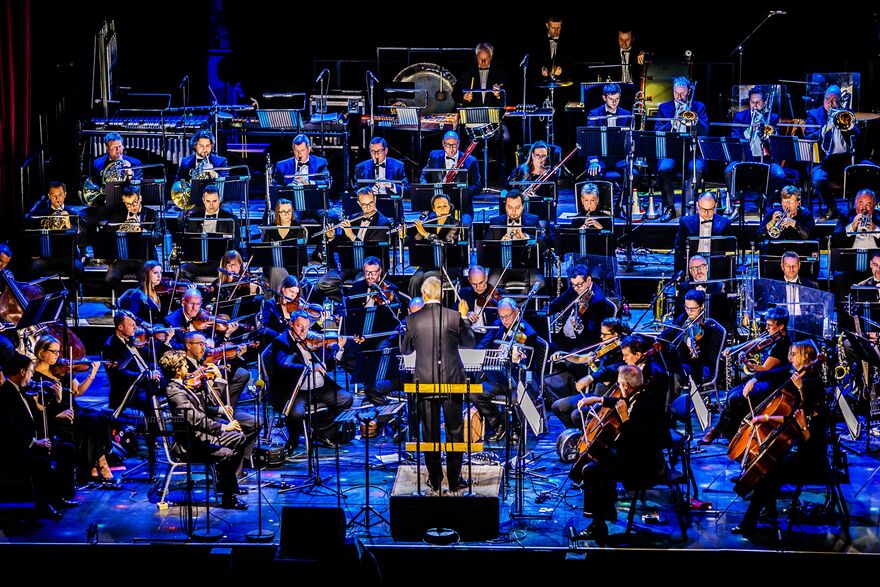 A wide shot of the BBC Concert Orchestra performing on stage.