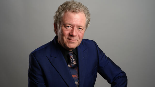 John Culshaw in a dark blue suit