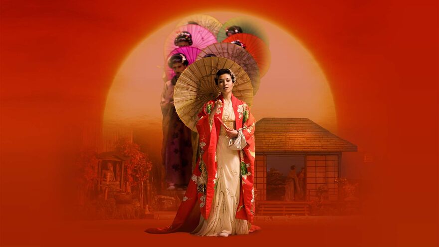 Lady in Japanese dress holding an umbrella