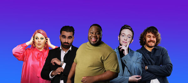 Five comedians stand together with a blue background