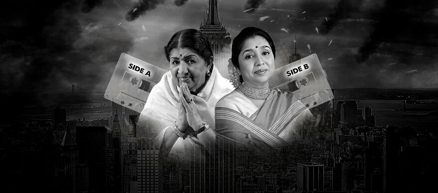 Lata Mangeshkar and Asha Bhosle in black and white with two cassette tapes behind them