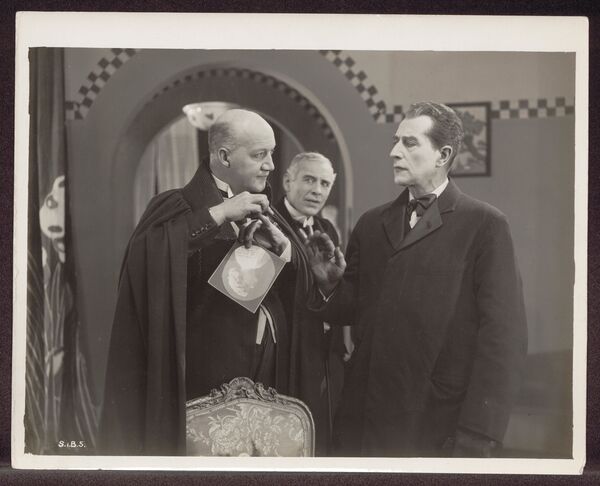 A black and white image of Eille Norwood as Sherlock Holmes. 