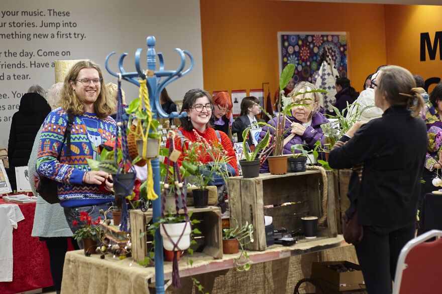 Customers and stall holders in Warwick Arts Centre foyer