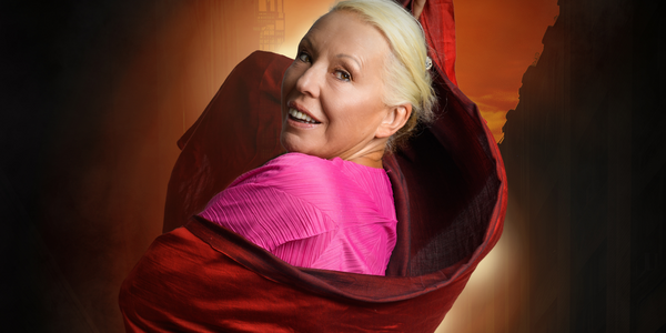Barb Jungr in a large red coat and a pink shirt Barb Jungr in a large red coat and a pink shirt