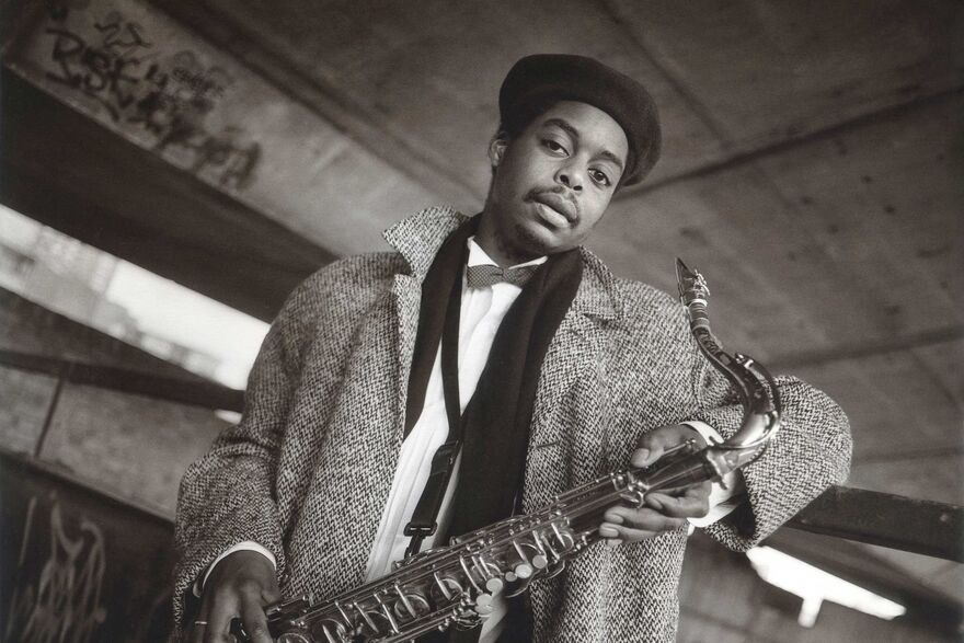 Courtney Pine holds a saxophone to the camera 