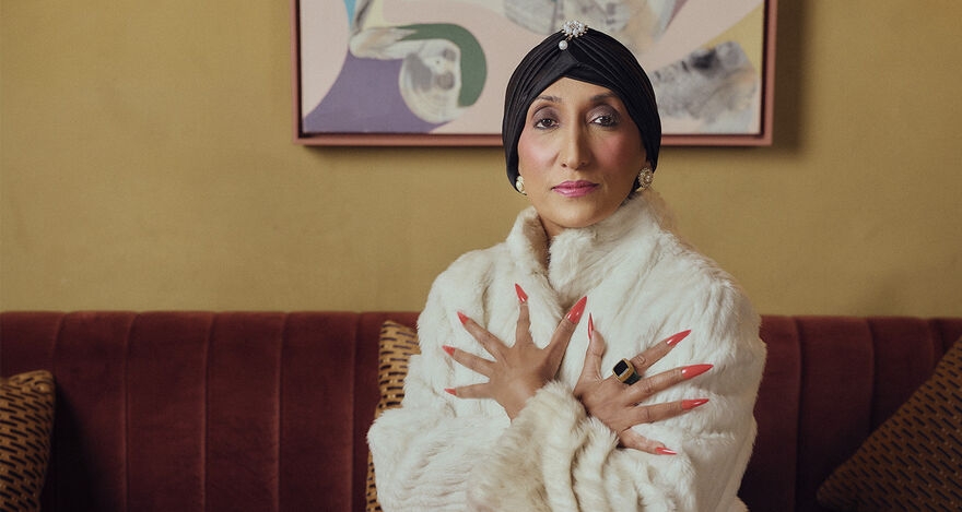 Shazia Mirza in a fluffy white jacket