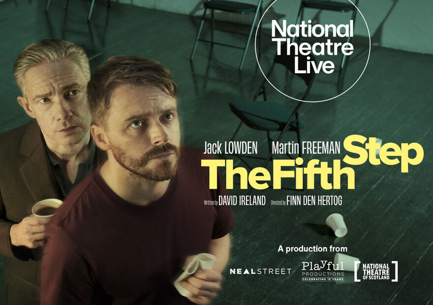 Jack Lowden and Martin Freeman as two men in Alcoholics Anonymous. They both look up as folding chairs and empty cups can be seen in the background.  