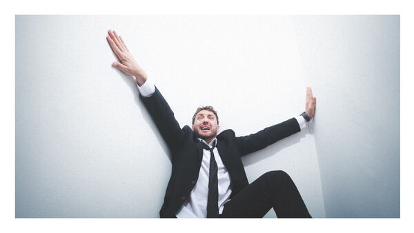 Seann Wlash sat looking scared in a corner 