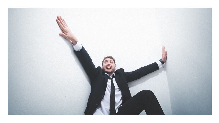 Seann Wlash sat looking scared in a corner 