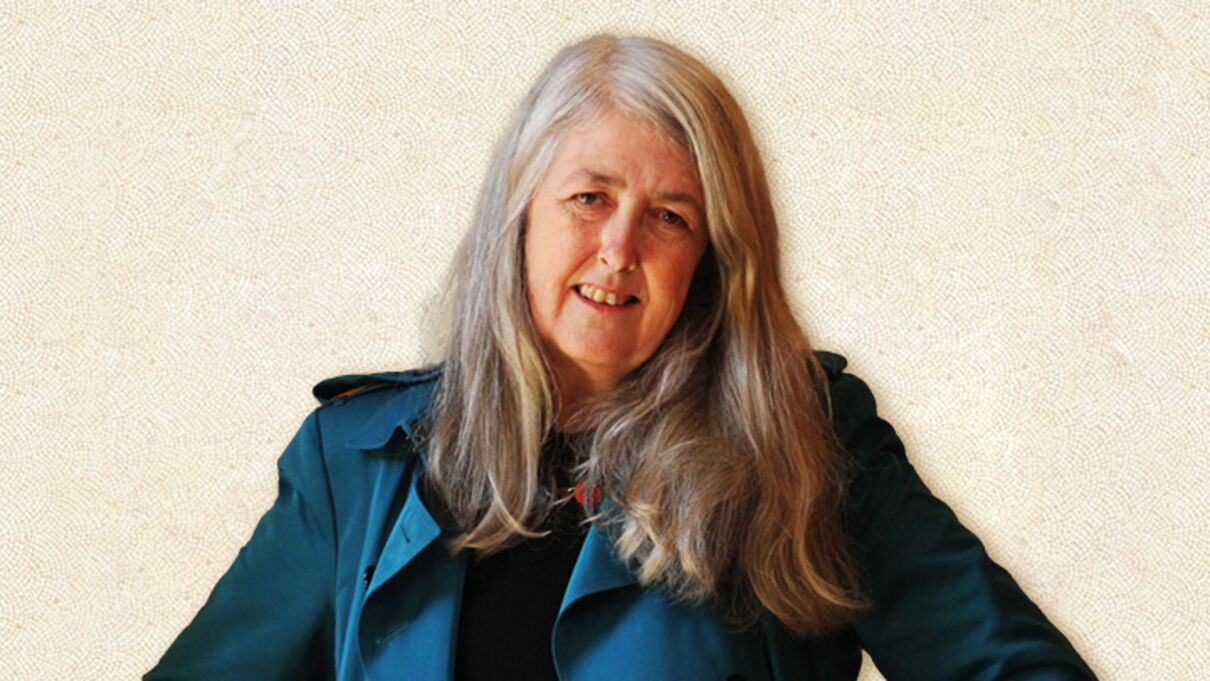 Drum kit on a dark stage lit in blue light