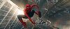 Spider-Man leaps high above skyscrapers as someone falls below him. 