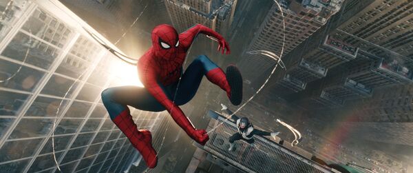 Spider-Man leaps high above skyscrapers as someone falls below him. 