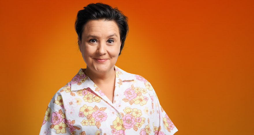 Susan Calman in a light flowery shirt 