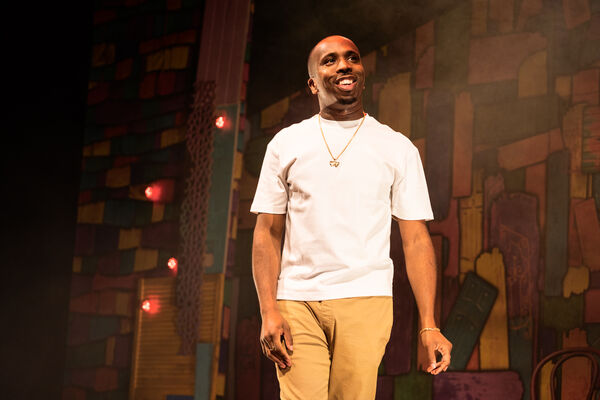 Kiell Smith-Bynoe in a white t shirt, smiling