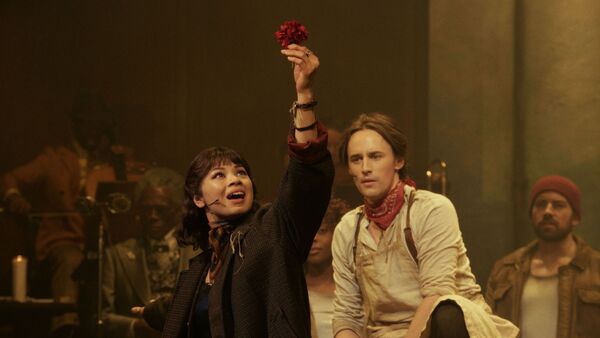 Eva Noblezada and Reeve Carney as Eurydice and Orpheus