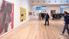 People in the Mead Gallery observing the artwork
