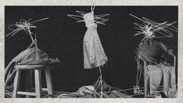 In black and white, a stool, coat-stand and chair are covered with clothes with white scribbles that make the shape of people