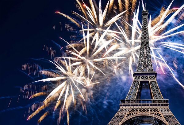 Eiffel Tower against a backdrop of fireworks