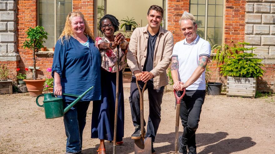 Portrait of Garden Rescue presenters Charlie Dimmock, Flo Headlam, Chris Hull and Lee Burkhill standing together outdoors with garden tools.
