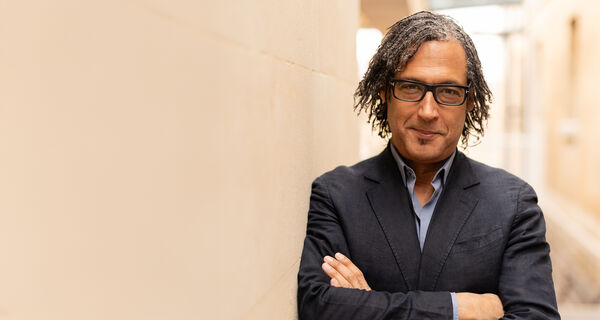 David looks at the camera with his arms folded David looks at the camera with his arms folded