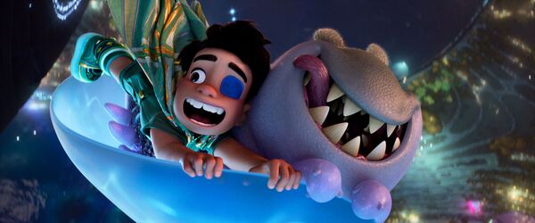 An animated image of a young boy and an alien flying through the air on a giant blue disk. 