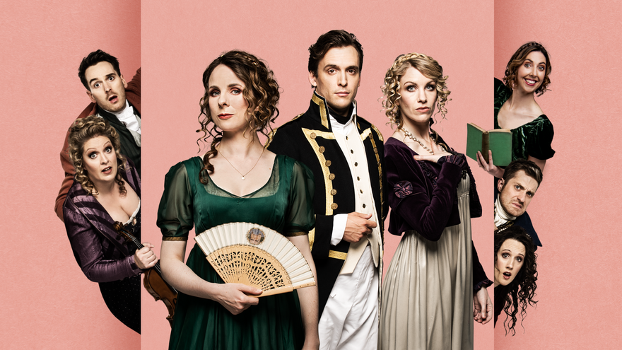 A group of eight actors dressed in Regency-era costumes pose against a pink background.
