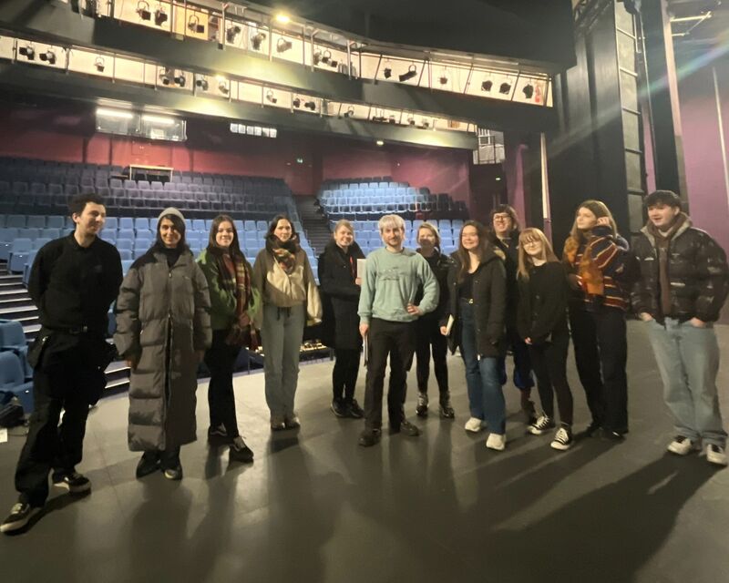 Venue Technician Bootcamp students pose backstage