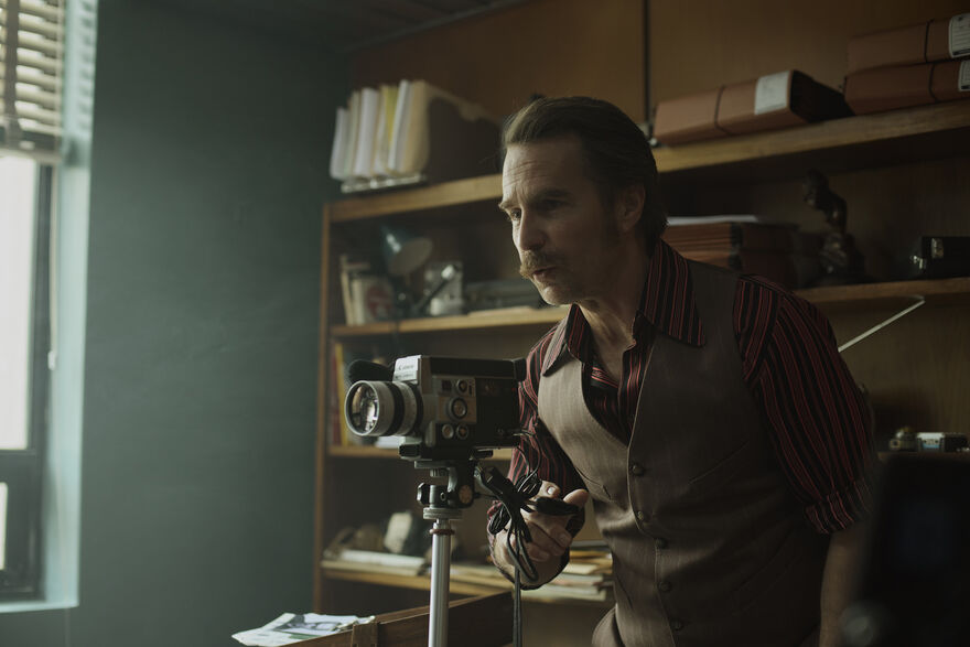 Sam Rockwell holding a vintage video camera