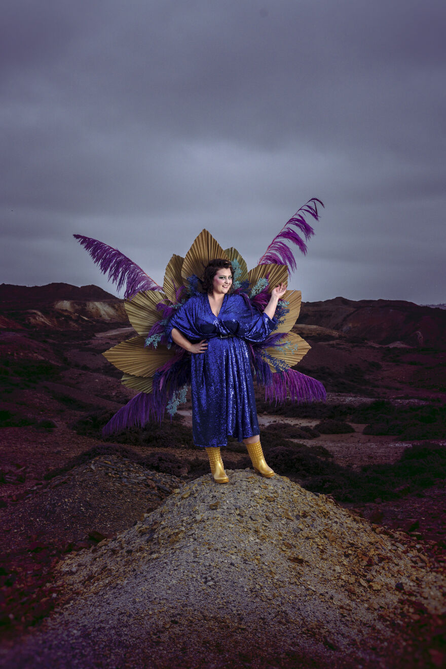 Kiri Pritchard-McLean wearing a sequin outfit and purple wings