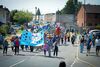 Canley Parade in procession on a road