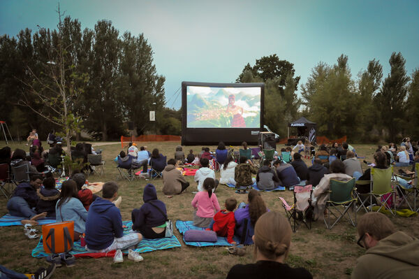 Families enjoying outdoor cinema in Canley as part of our Playing Out project
