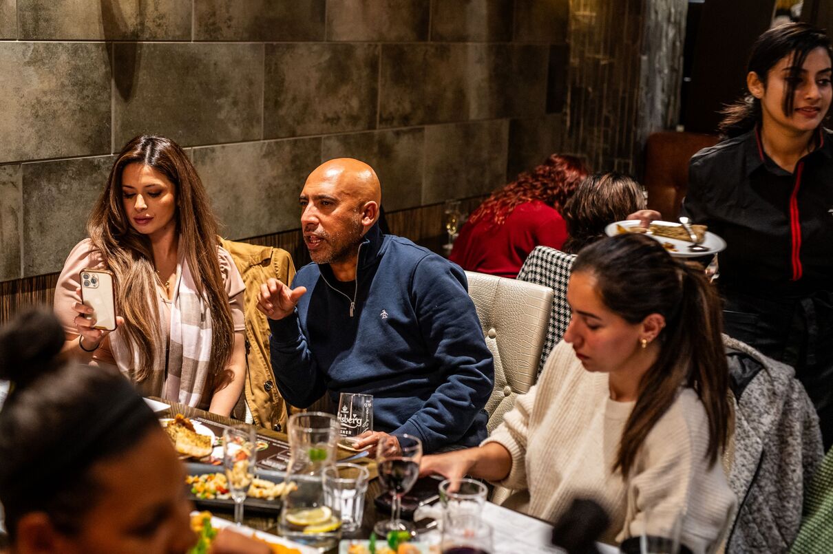 Diners eating at a table