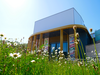 Warwick Arts Centre Exterior with flowers in the foreground