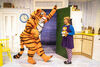 Two performers on stage - one dressed as a tiger dancing
