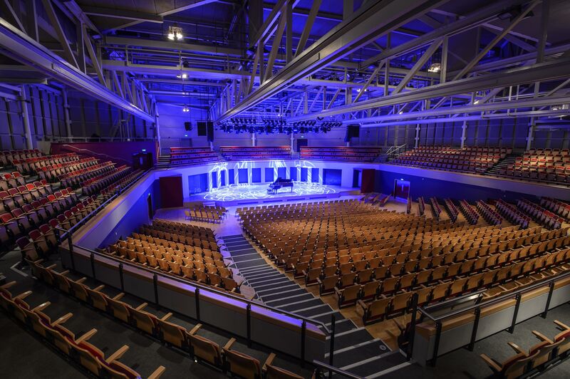 Empty Butterworth Hall with a Steinway piano on the stage