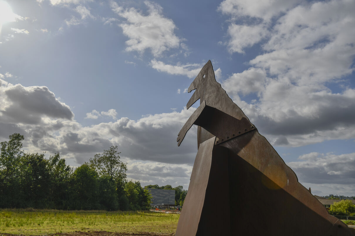 Image of dinosaur sculpture outside