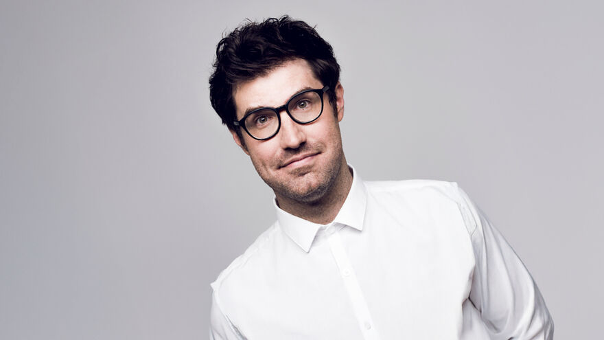 Dan Schreiber wearing a white shirt