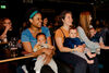 Three mothers with babies on their laps