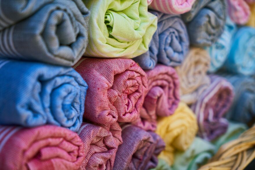 Stacks of different coloured cloth