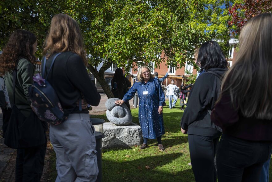 Studnets looking at sculpture 