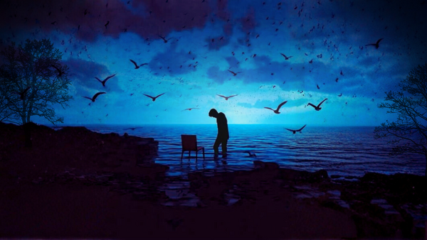 A silhouetted figure and an empty chair stand in shallow dark water against a glowing blue ocean horizon, with birds flying in the moody sky above.