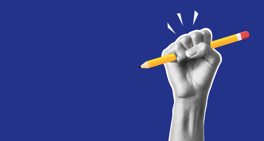 A hand holding a pencil with a blue background