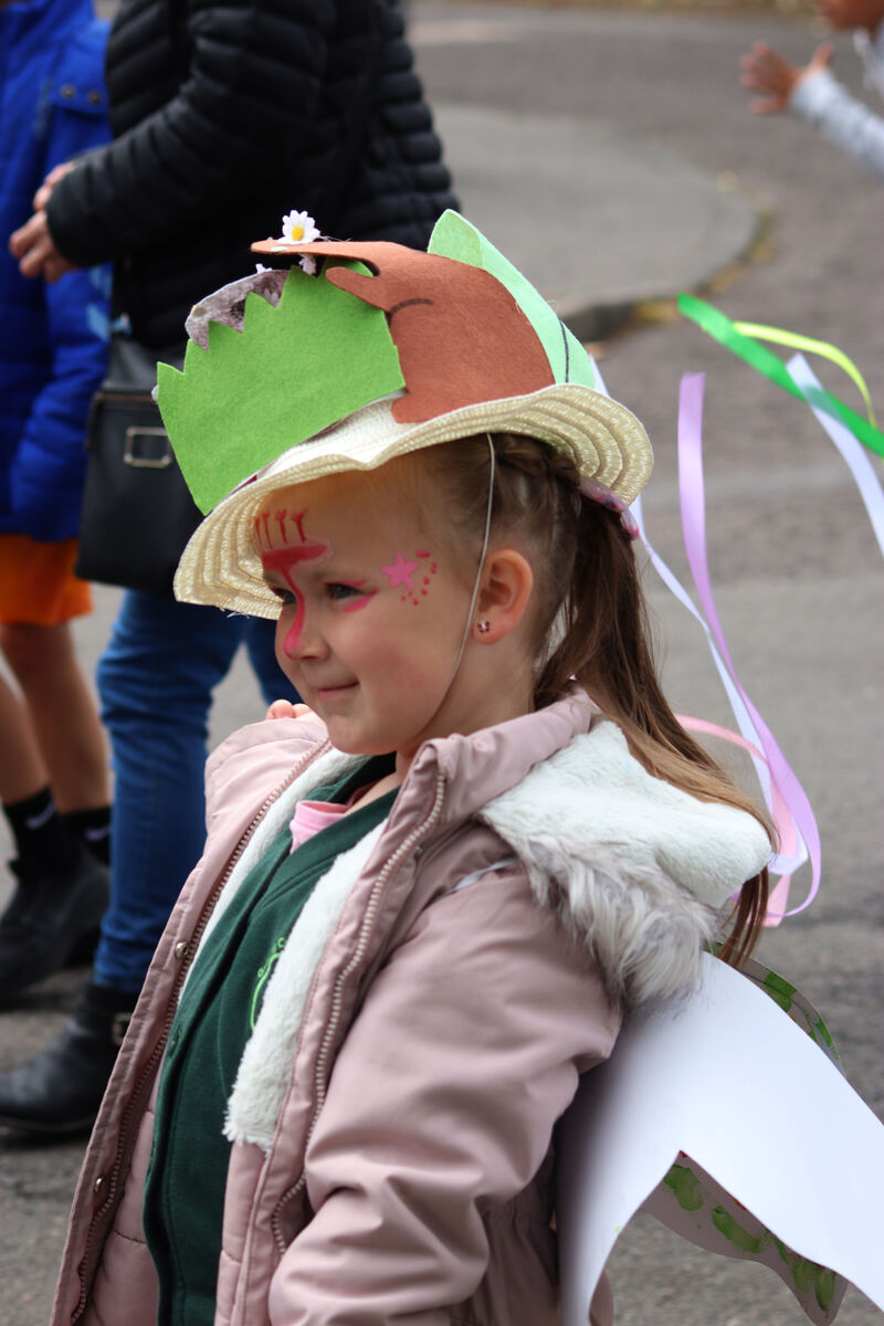 A close-up side profile of a young child participating in the Canley Parade.