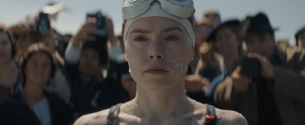 Daisy Ridley as Trudy Ederle preparing to swim the English Channel. 
