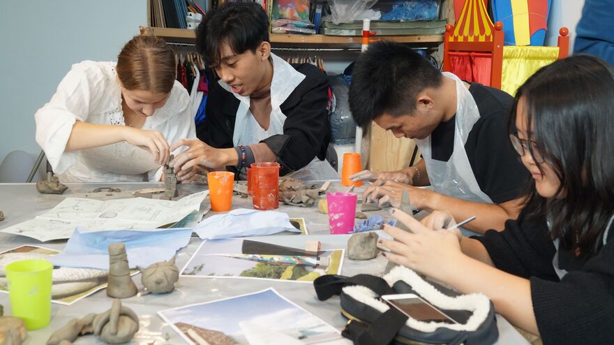 Students in clay workshop in the Creative Learning Space