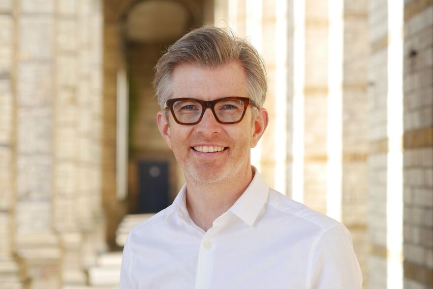 Gareth Malone stood outside smiling