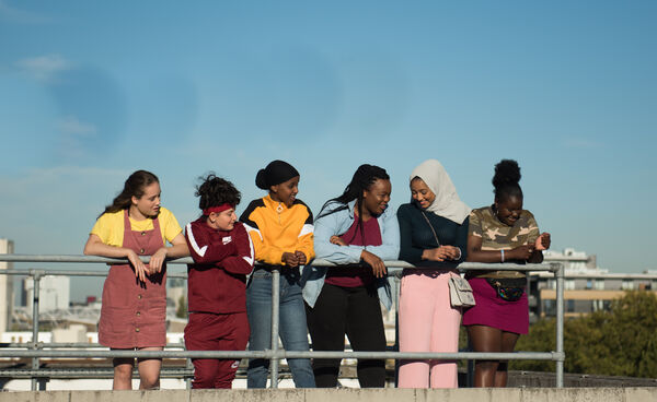 A group of teenage girls on a rooftop