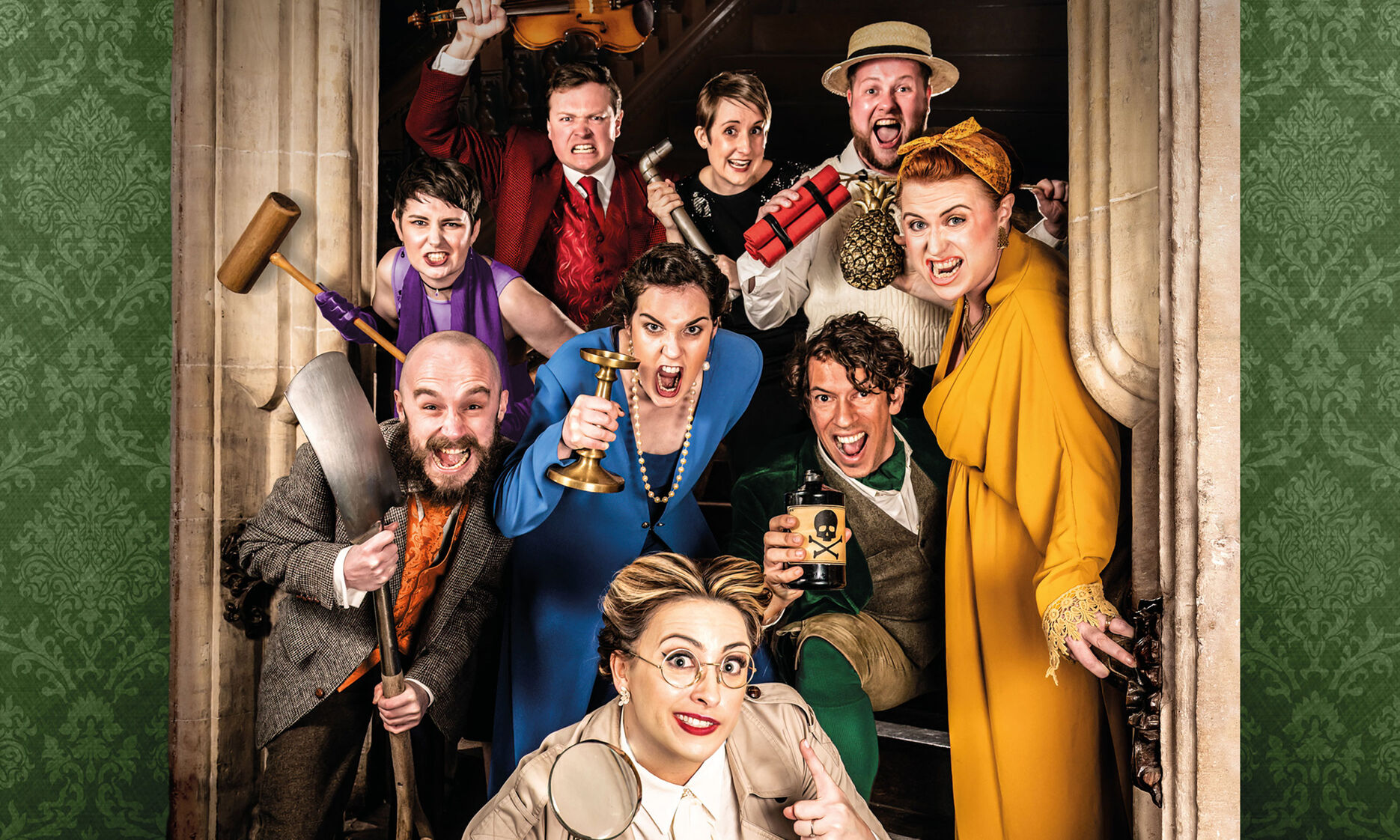 A group of people in a doorway holding different items 